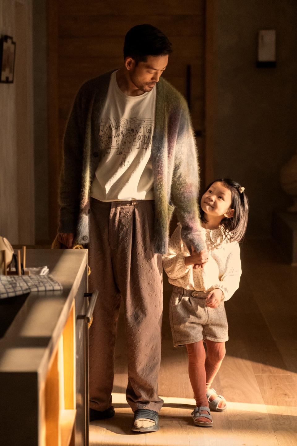 Joseph Lee as Amy's husband George and Remy Holt as her daughter June in "Beef."