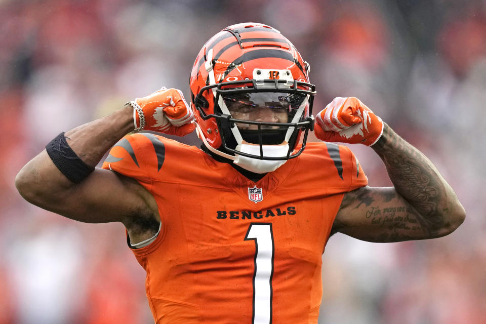 Cincinnati Bengals wide receiver Ja'Marr Chase (1) celebrates a first down during the second half of an NFL football game against the Pittsburgh Steelers in Cincinnati, Sunday, Nov. 26, 2023. (AP Photo/Carolyn Kaster)