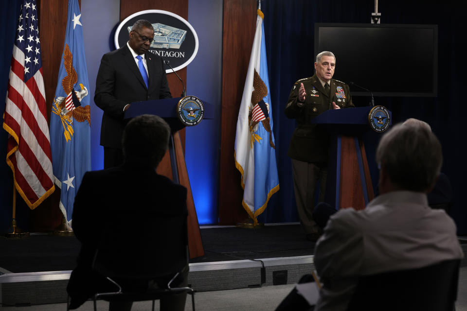 U.S. Secretary of Defense Lloyd Austin (L) and Chairman of Joint Chiefs of Staff Gen. Mark Milley (R) participate in a news briefing at the Pentagon July 21, 2021 in Arlington, Virginia. Secretary Austin and Gen. Milley held a news briefing to discuss various topics including the U.S. withdrawal from Afghanistan. / Credit: Alex Wong / Getty Images