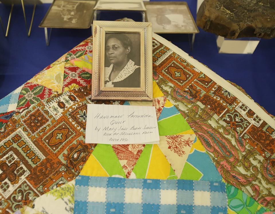 A homemade patchwork quilt by Mary Jane Burns Johnson, a cook at Springhill Farm, circa 1950, is on display at the Massillon Museum as part of a new exhibit on Black residents and culture in the community.