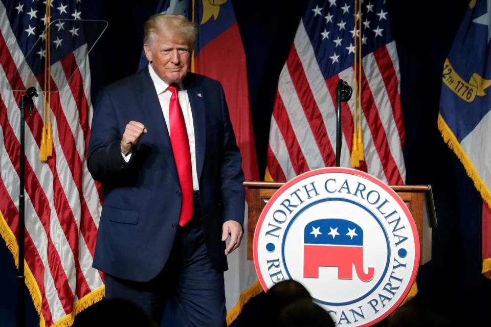 Former President Donald Trump acknowledges the crowd as he speaks at the North Carolina Republican Convention on June 5  in Greenville, N.C.  