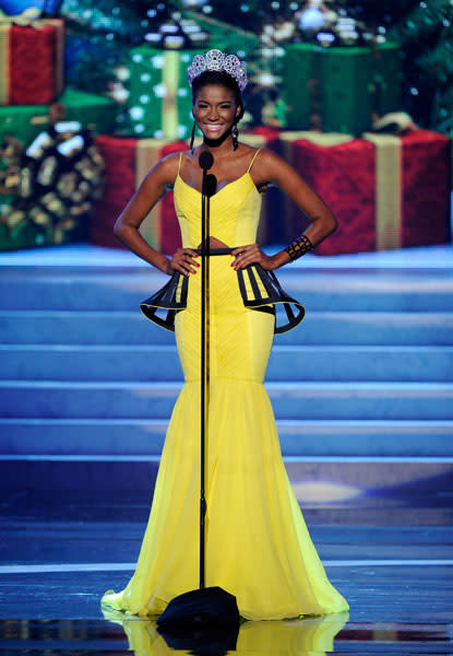 <b>Miss Universe 2012 </b><br><br>Miss Angola Leila-Lopes, the winner of Miss Universe 2011, looks stunning in yellow as she makes a speech at the pageant.<br><br>© Getty