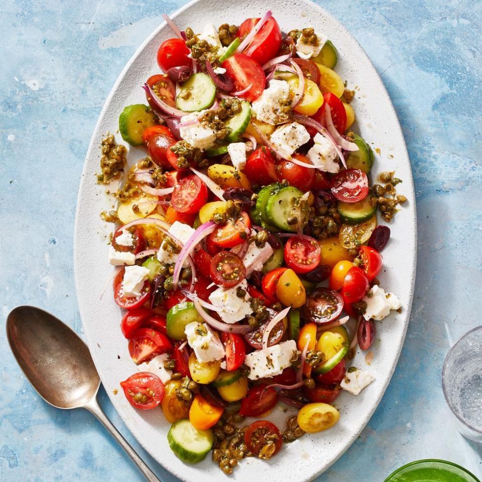 greek salad with tomato, red onion, feta, cucumber and capers