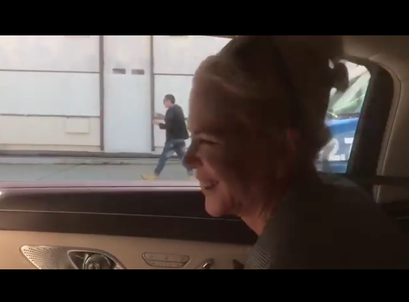 Nicole Kidman is seen laughing while she drives off winding up her window. Source: Instagram/nicolekidman