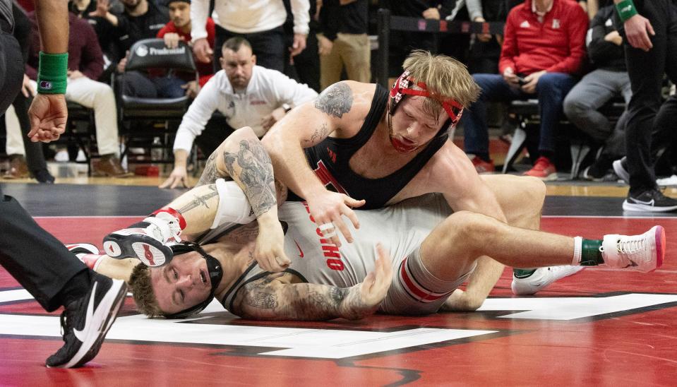 Rutgers' Jackson Turley (top) was defeated 4-3 by Ohio State's Rocco Welsh Sunday in the 174-pound bout.