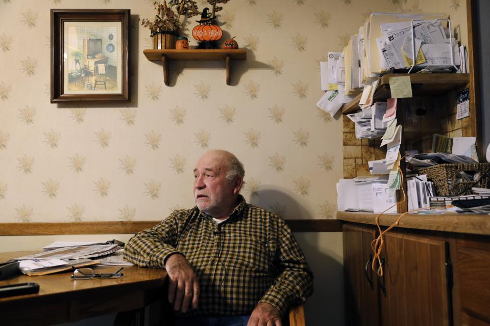 In this Oct. 30, 2018, photo, Chris Petersen talks about his farming operation in Clear Lake, Iowa. The spread of corporate animal farms is turning neighbor against neighbor in town halls and courtrooms across rural America. Iowa, the top U.S. producer of swine and egg-laying chickens, has been a major battleground. "It's a fight for survival," said Petersen, one of the dwindling holdouts who still raise pigs in outdoor pens. (AP Photo/Charlie Neibergall)