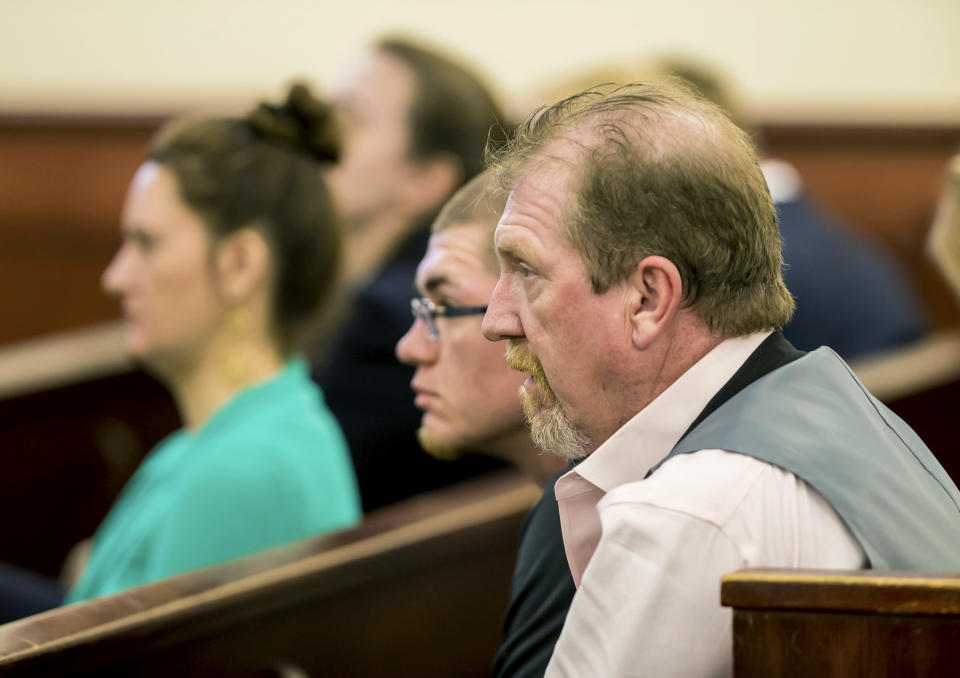 In this Monday, June 3, 2019 photo, Timothy Jones, Sr. listens to closing arguments during the murder trial of his son Timothy Jones, Jr., at the Lexington County Courthouse, in Lexington, Ky. Jurors are again deliberating whether the South Carolina father is guilty of murder in the deaths of his five children. (Jeff Blake/The State via AP, Pool)