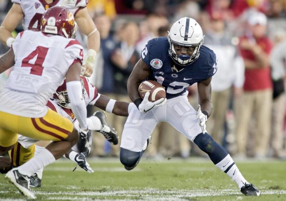 Penn State wide receiver Chris Godwin runs down the field with the ball from USC defenders during the 2017 Rose Bowl on Monday, January 2, 2017.