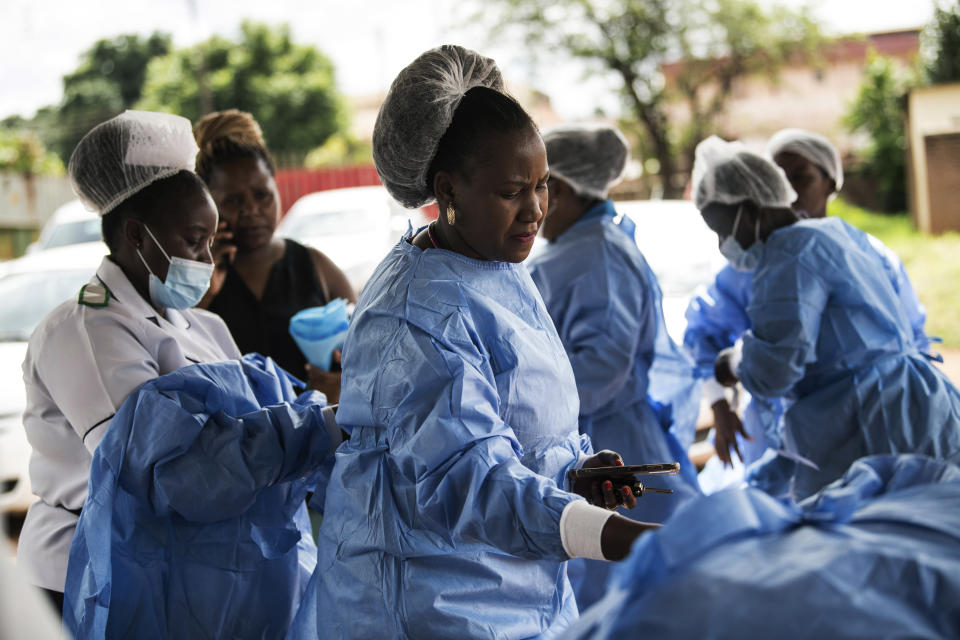 Health workers prepare to see patients suffering with cholera at Bwaila Hospital in Lilongwe central Malawi Wednesday, Jan. 11, 2023. Malawi’s health minister says the country’s worst cholera outbreak in two decades has killed 750 people so far. The southern African country of 20 million people first reported the outbreak in March last year. (AP Photo/Thoko Chikondi)