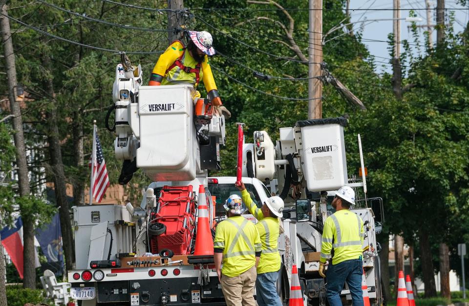 A Praxel Line Service crew from Kentucky works to restore power on Teel Avenue Tuesday, Aug. 29, 2023 from last Thursday's major storm.