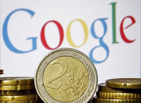 Euro coins are seen in front of a Google logo in this picture illustration taken in Zenica, April 21, 2015. REUTERS/Dado Ruvic