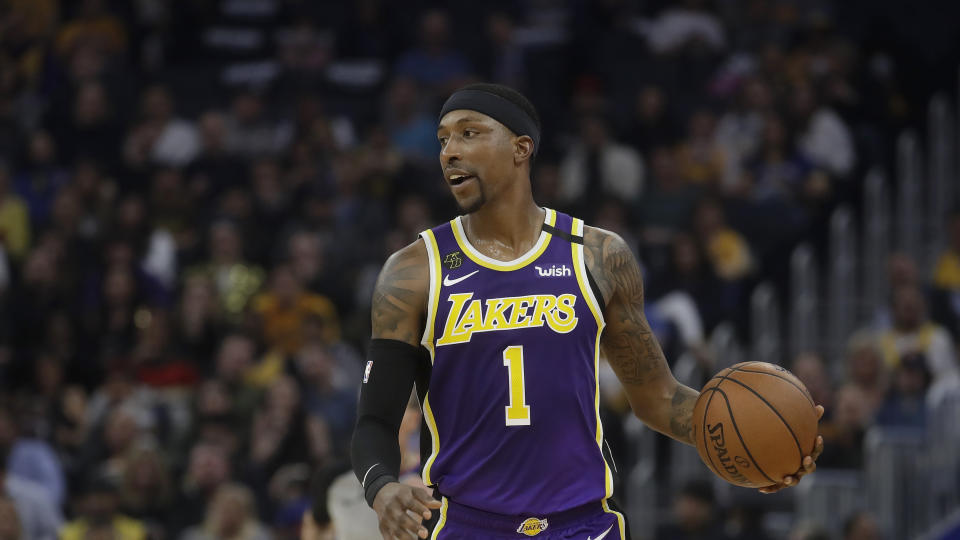 Los Angeles Lakers guard Kentavious Caldwell-Pope (1) against the Golden State Warriors during an NBA basketball game in San Francisco, Thursday, Feb. 27, 2020. (AP Photo/Jeff Chiu)