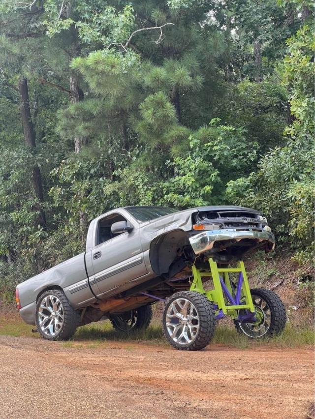 You Could Buy This Chevy Silverado Squat Truck With a 42-Inch Lift, But  Please Don't