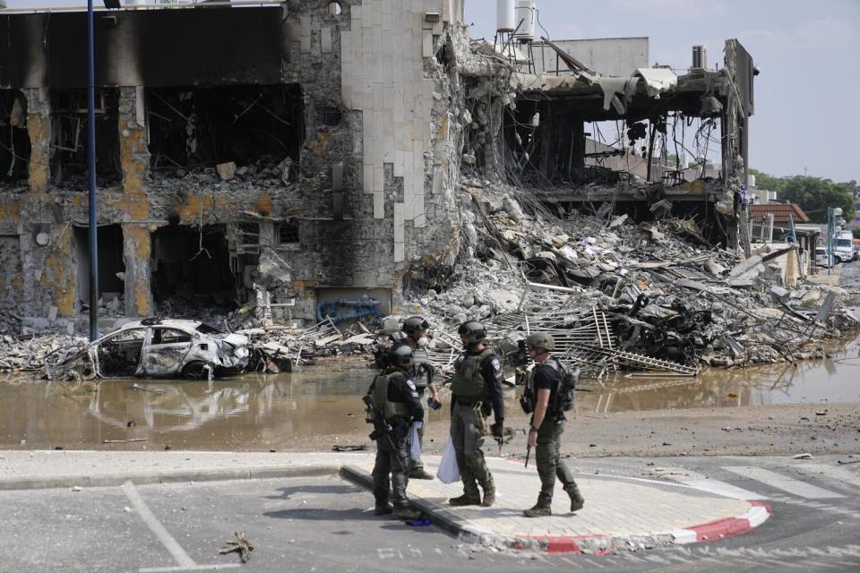 Israeli police outside a police station that was overrun by Hamas gunmen