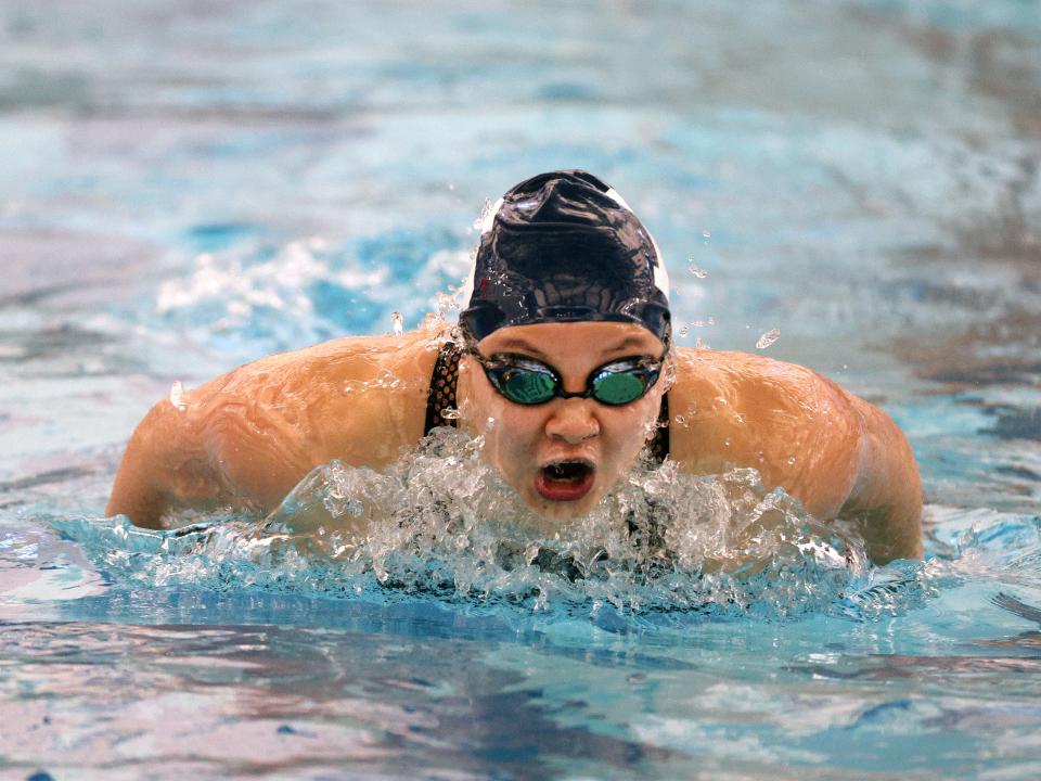 Brighton’s Mingna Xu competes in the 100 Yard Butterfly at the NYS Federation Championships. She finished 5th with a time of 56.13. 