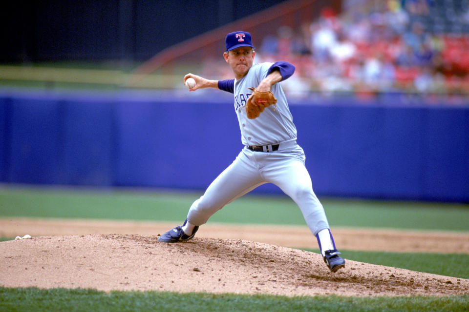 UNDATED:  Pitcher Nolan Ryan #34 of the Texas Rangers delivers a pitch during a game circa 1989-1993.  (Photo by Ron Vesely/MLB Photos via Getty Images)  