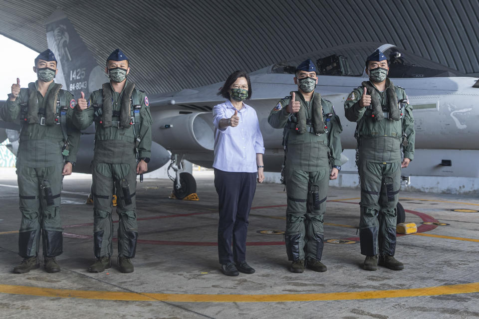 In this photo released by the Taiwan Ministry of National Defense, Taiwan's President Tsai Ing-wen is briefed during a visit to a naval station on Penghu, an archipelago of several dozen islands off Taiwan's western coast on Tuesday, Aug. 30, 2022. Tsai told the self-ruled island's military units Tuesday to keep their cool in the face of daily warplane flights and warship maneuvers by rival China, saying that Taiwan will not allow Beijing to provoke a conflict. visit to the She also inspected a radar squadron, an air defense company, and a navy fleet. (Taiwan Ministry of National Defense via AP)