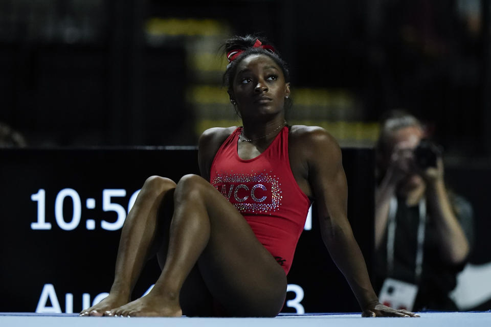 Simone Biles, a seven-time Olympic medalist and the 2016 Olympic champion, warms up during a practice session at the U.S. Classic gymnastics competition Friday, Aug. 4, 2023, in Hoffman Estates, Ill. (AP Photo/Morry Gash)