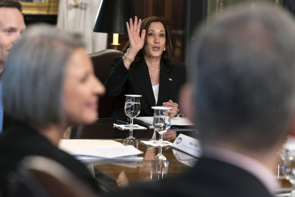 Vice President Kamala Harris waves goodbye to members of the media, while attending a meeting with business CEO's about economic development in the Northern Triangle, Thursday, May 27, 2021, from her ceremonial office on the White House complex in Washington. (AP Photo/Jacquelyn Martin)