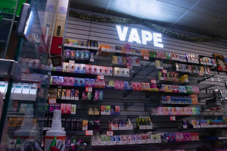 Disposable e-cigarettes line the shelves of a Chapel Hill convenience store on April 25, 2024.