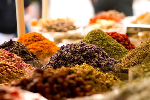 Spices at a Dubai souk - Credit: GETTY