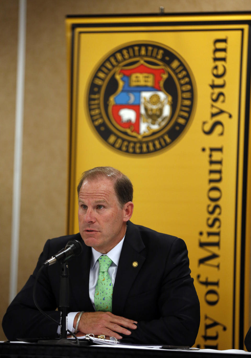 University of Missouri President Tim Wolfe speaks during a news conference Friday, April 11, 2014, in Rolla, Mo. The news conference was held to discuss an outside legal review of the university's response to a case involving school swimmer Sasha Menu Courey, who killed herself 16 months after an alleged off-campus rape by as many as three football players in February 2010. (AP Photo/Jeff Roberson)