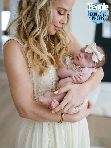 <p>Jenny Quicksall Photography</p> Tara Lipinski and baby Georgie