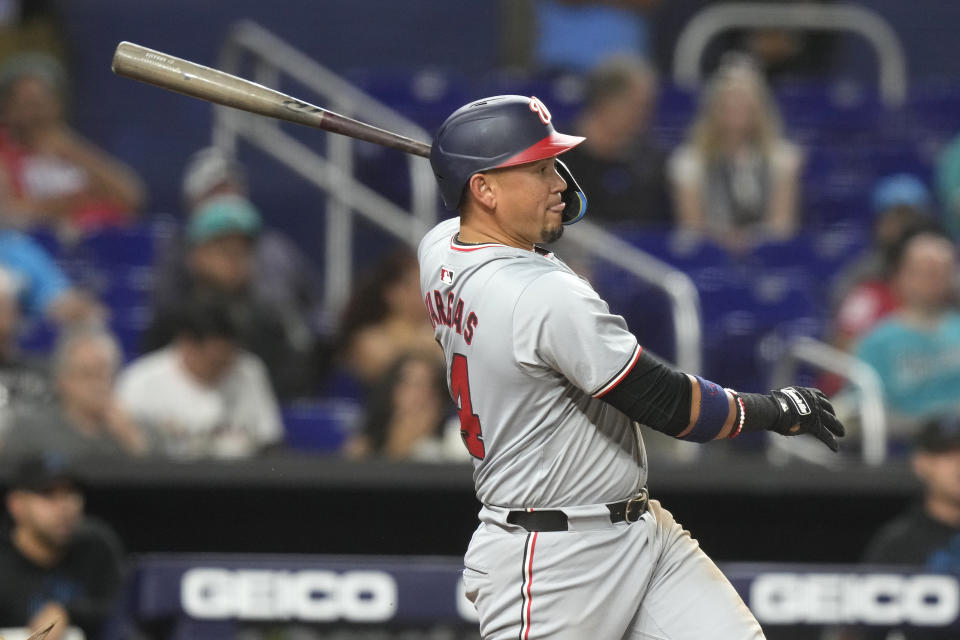Washington Nationals' Ildemaro Vargas follows through on an RBI single to score Joey Meneses during the seventh inning of a baseball game against the Miami Marlins, Monday, April 29, 2024, in Miami. (AP Photo/Lynne Sladky)