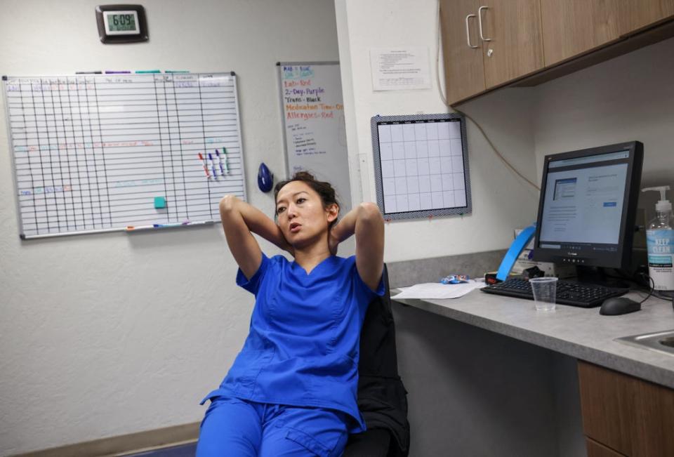 Tien sits at her desk after finishing the last abortion of the day at the Trust Women clinic in Oklahoma City (Reuters)