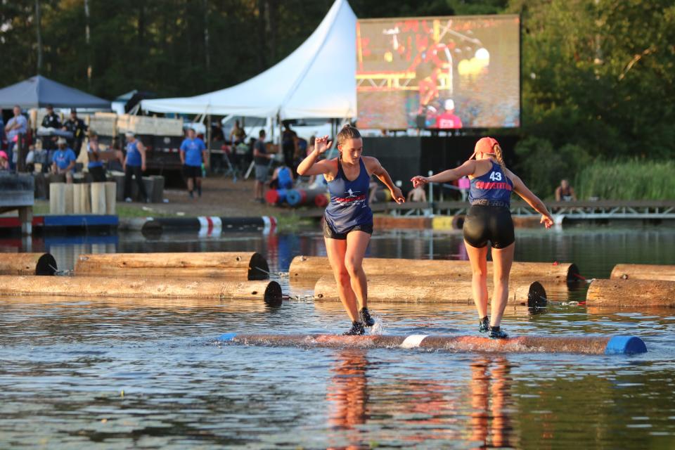 Ellie Davenport (facing away from camera) finished second in the women's pro final at the Lumberjack World Championships in July.