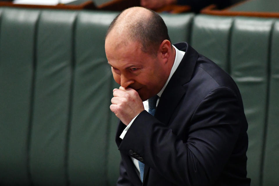 CANBERRA, AUSTRALIA - MAY 12: Treasurer Josh Frydenberg delivers a ministerial statement on the Australian economy in the House of Representatives at Parliament House on May 12, 2020 in Canberra, Australia. Parliament will resume for three days this week but is otherwise adjourned until August. Australian states are now beginning to lift COVID-19 measures with national cabinet mapping out a three-stage program to help the economy return to normal, Treasury estimates it would cost NSW and Victoria $2.4 billion a week combined in lost economic activity if the states had to re-impose the restrictions it started loosening. Mr Frydenberg is facing the largest budget deficit in Australian fiscal history with Deloitte zAccess Economics predicting it could reach $143 billion this year and $131.6 billion in 2020-21 financial year as the economy slumps due to measures aimed at stopping the spread of the COVID-19 pandemic. (Photo by Sam Mooy/Getty Images)