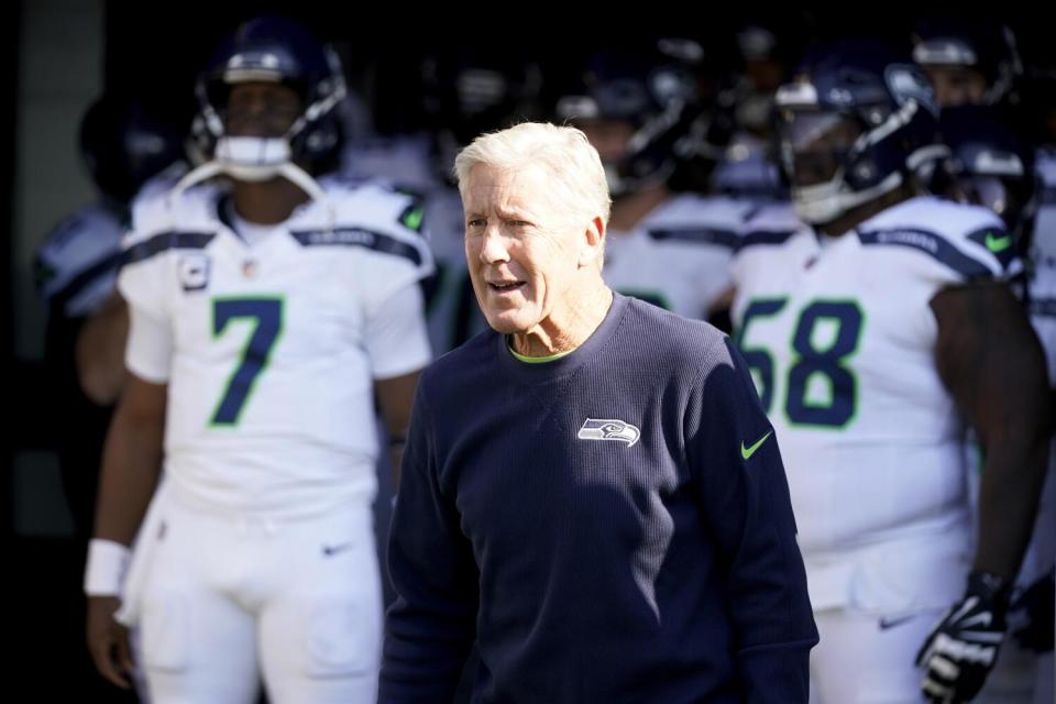 Seattle Seahawks head coach Pete Carroll waits to run onto the field in Baltimore.