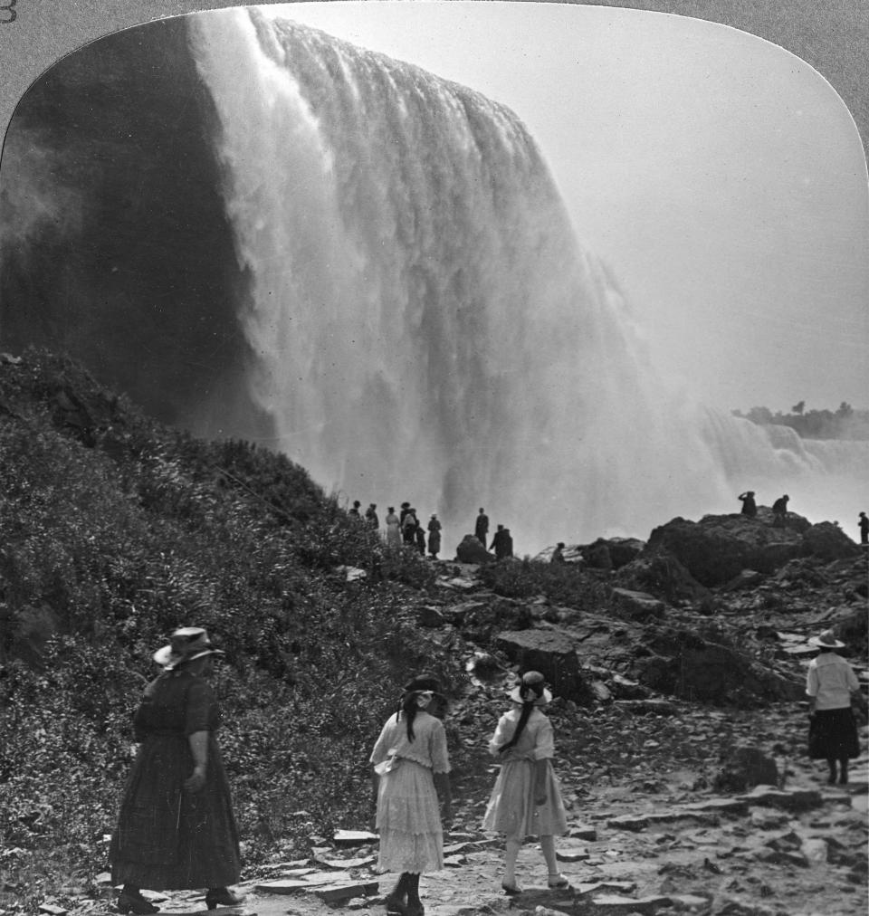 Tourists observe the American Falls in the summer of 1753.