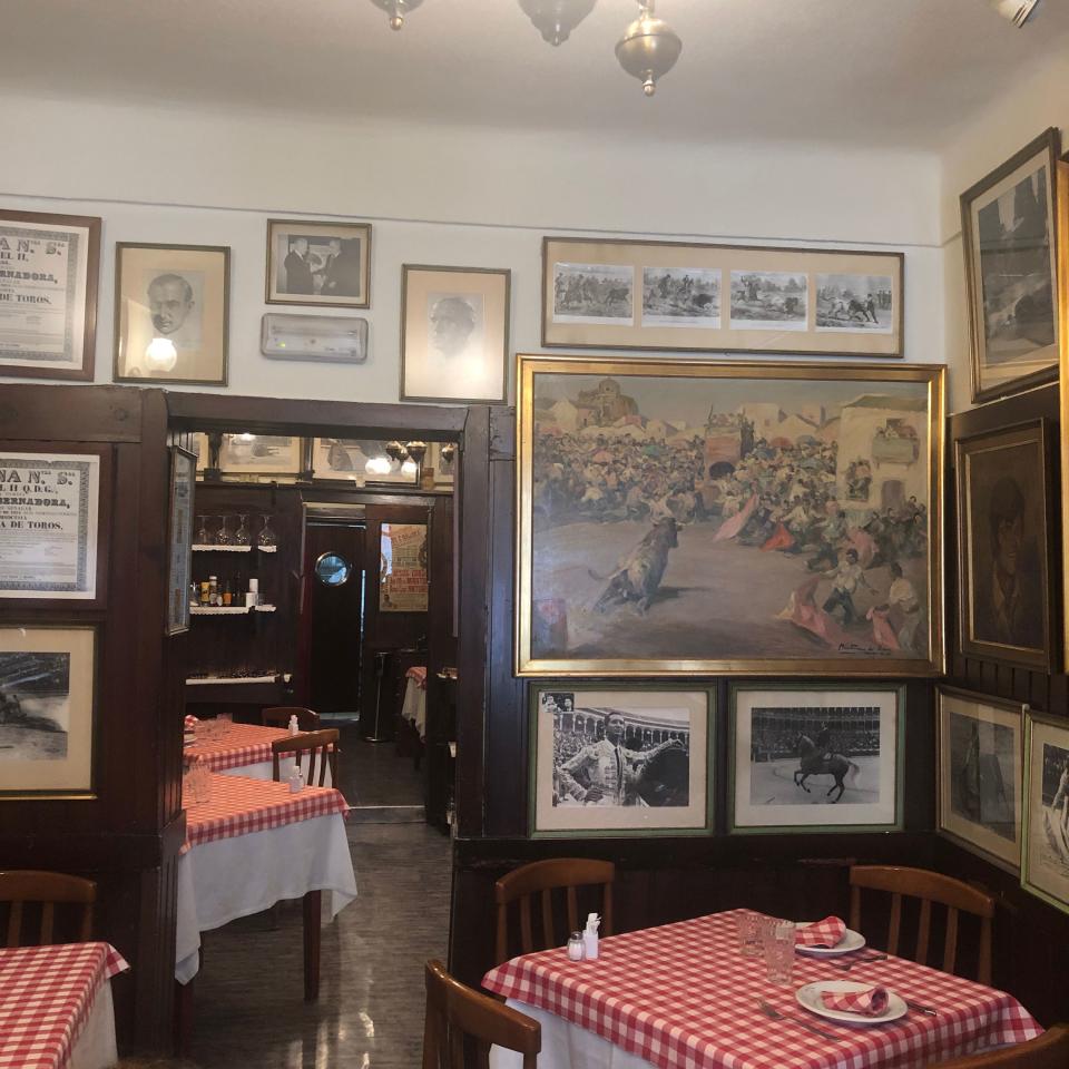 At Restaurante Casa Salvador, with its charming checked tablecloths and rousing imagery of matadors.