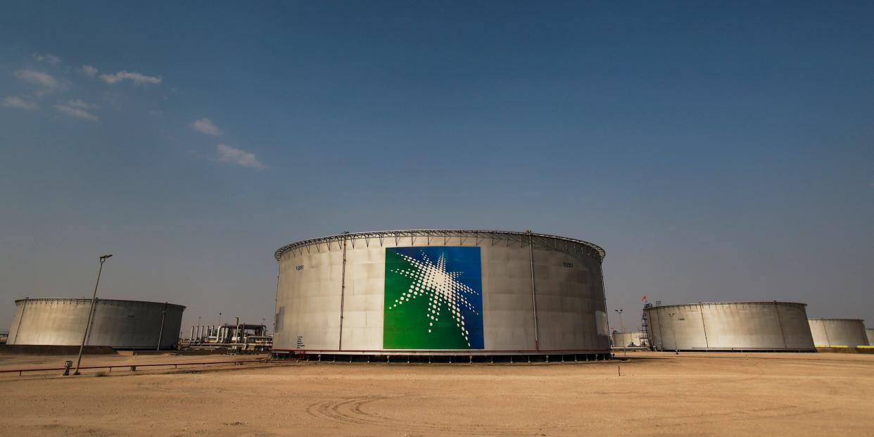 FILE PHOTO: A view shows branded oil tanks at Saudi Aramco oil facility in Abqaiq, Saudi Arabia October 12, 2019. REUTERS/Maxim Shemetov/File Photo