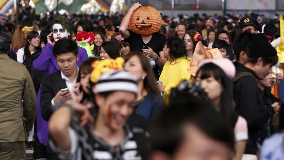 Halloween night in Tokyo's Shibuya district in 2014. - Yuya Shino/Reuters