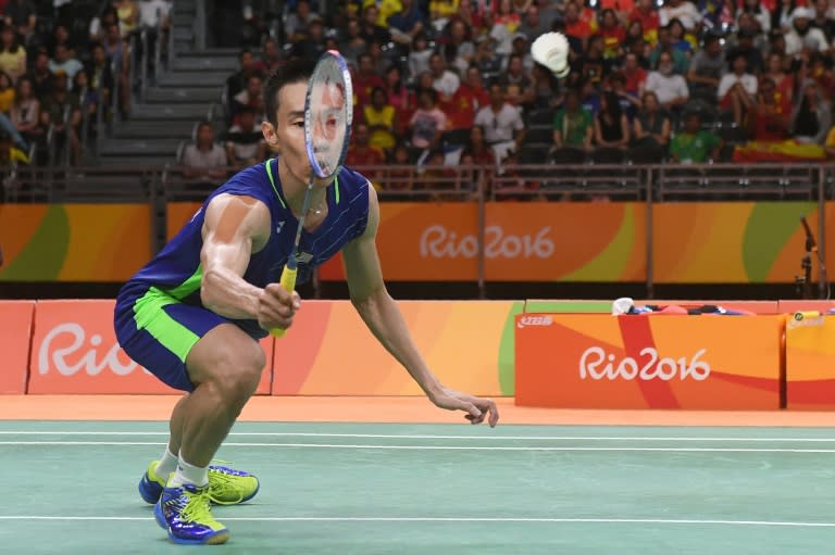 Lee Chong Wei hits a return against China's Lin Dan during their badminton men's singles semi-final in Rio on August 19, 2016