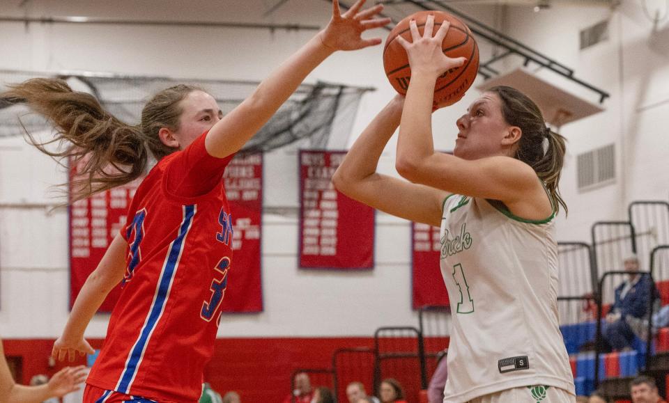 Brick’s Riley Nausedas pulls back and shoot as Ocean’s Kayden Clark covers her. Ocean Township High School Girls Basketball dominates Brick High School in NJSIAA Central Jersey Group 3 first round game in Ocean Twp. on February 22,, 2024.