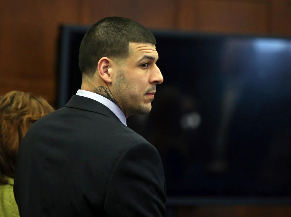 Former New England Patriots tight end Aaron Hernandez died in prison while serving a life sentence for the 2013 killing of semi-professional football player Odin Lloyd.  / Credit: Nancy Lane/MediaNews Group/Boston Herald via Getty Images