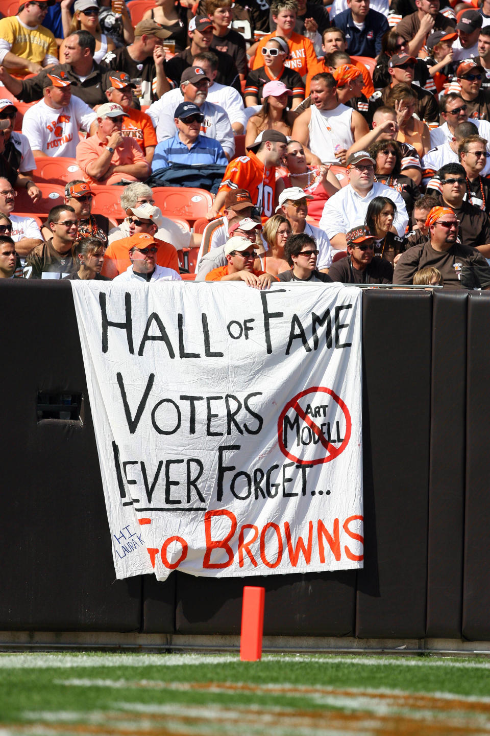 Browns fans show off a banner in remembrance of ex-owner, Art Modell and how he moved the franchise to Baltimore at Cleveland Browns Stadium, Sept. 30, 2007. The Browns defeated the Ravens 27-13.