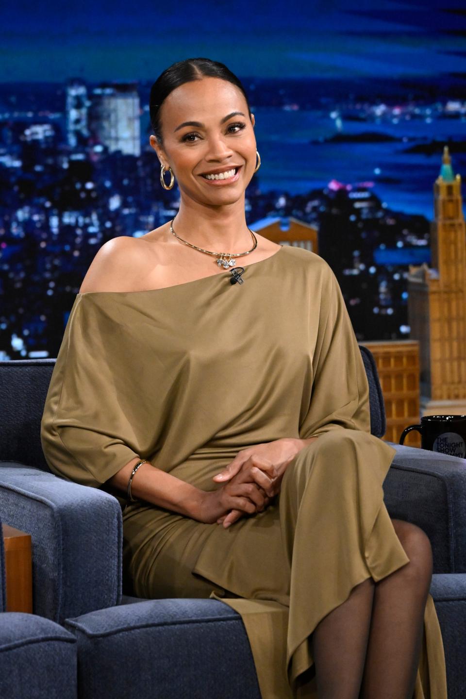 Actress Zoe Saldaña during an interview on Thursday, March 28, 2024, khaite dress, tonight show starring jimmy fallon