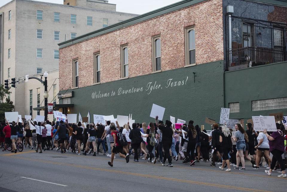 Demonstrators march in Tyler to protest the death of George Floyd, on June 1, 2020.