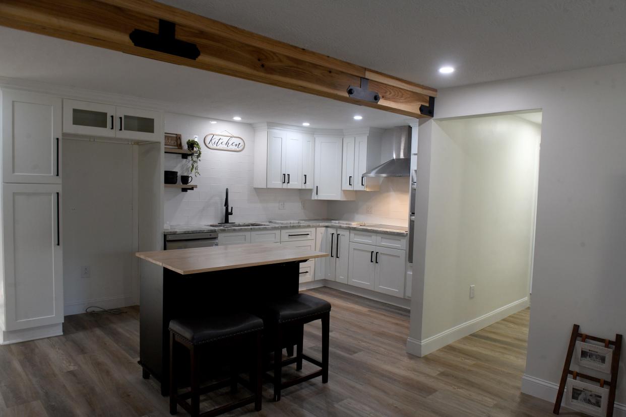 The kitchen is shown in a Lake Township home that has been remodeled in a modern farmhouse style.