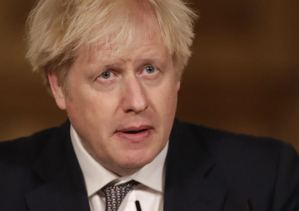 LONDON, ENGLAND - DECEMBER 16: United Kingdom Prime Minister Boris Johnson speaks during a news conference on the ongoing situation with the coronavirus pandemic, inside 10 Downing Street on December 16, 2020 in London, England. (Photo by Matt Dunham - WPA Pool/Getty Images)