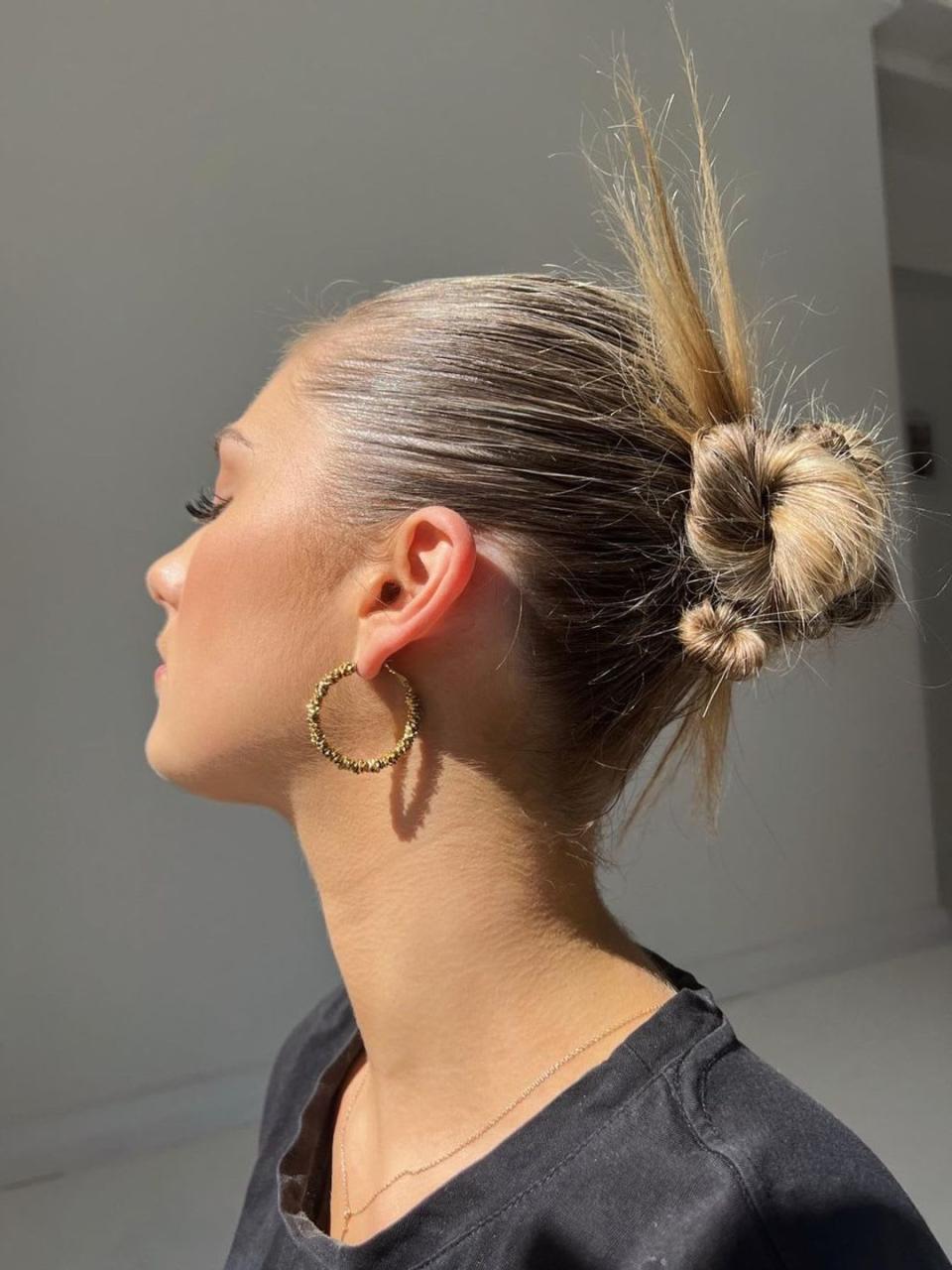 Sleek spiky bun @milly_amybaineshair