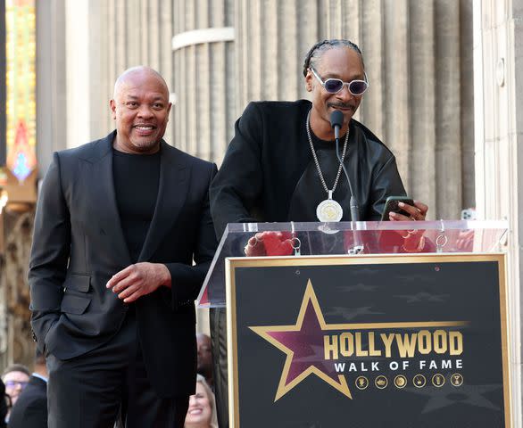 <p>Monica Schipper/Getty</p> Dr. Dre and Snoop Dogg in Los Angeles on March 19, 2024