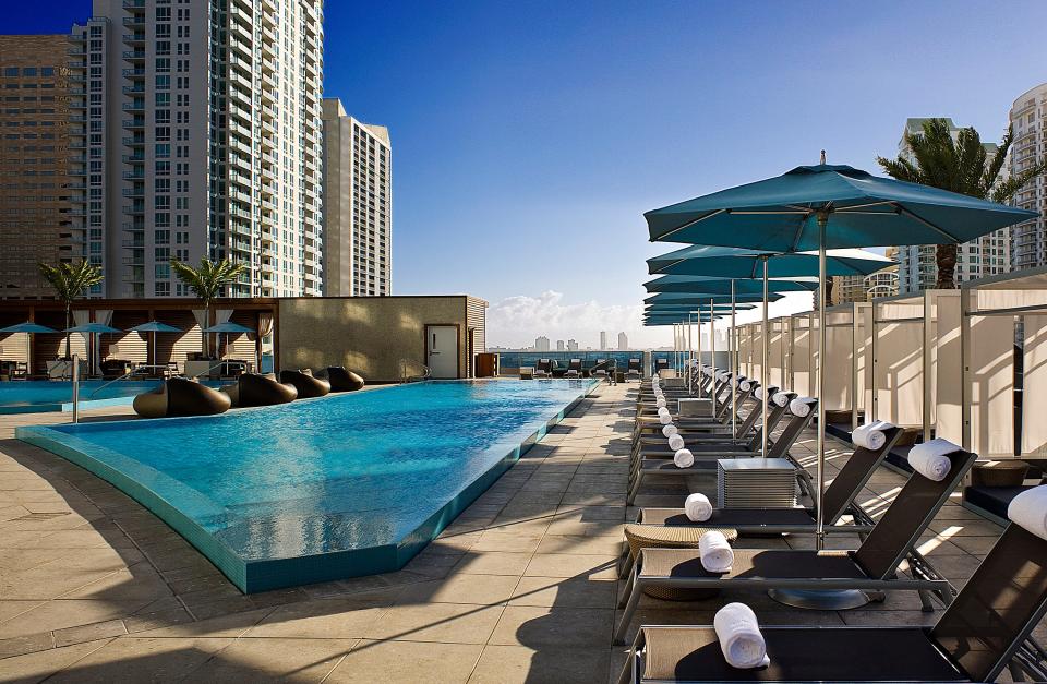 With its panoramic views of the Miami River and Biscayne Bay, the Kimpton Epic Hotel feels like a luxurious waterfront property. While public transportation options stop right outside the front door, everything guests need – restaurants, rooftop pools and a spa – are all on-site.