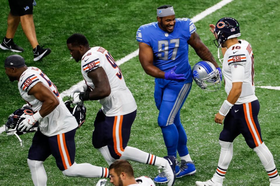 Lions defensive tackle Nick Williams shakes hands with Bears quarterback Mitchell Trubisky before the season opener on Sunday, Sept. 13, 2020, at Ford Field.