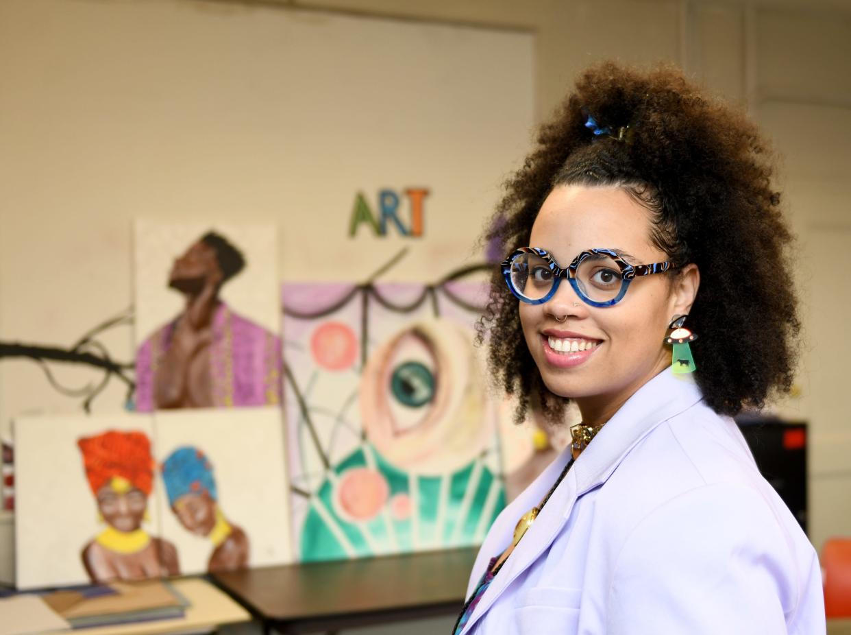 Ashley Palmer of Canton owns Palmystree and is an entrepreneur, freelance artist, graphic designer, web designer and musician. She's also an art teacher.