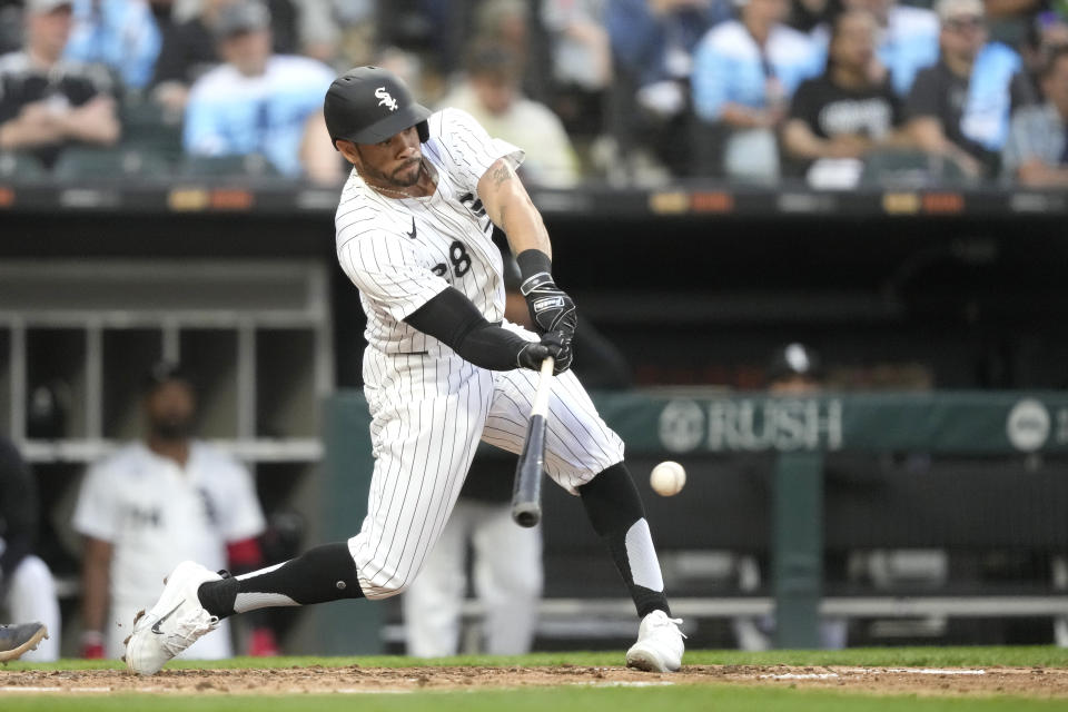 Chicago White Sox's Tommy Pham singles off Tampa Bay Rays starting pitcher Aaron Civale during the third inning of a baseball game Saturday, April 27, 2024, in Chicago. (AP Photo/Charles Rex Arbogast)